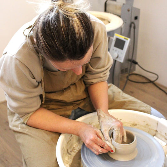 Making pottery on a wheel, a private session